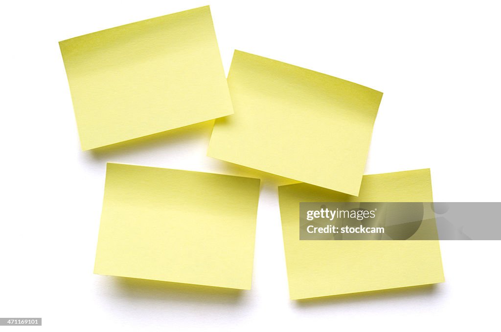 Four Post-it Notes on white