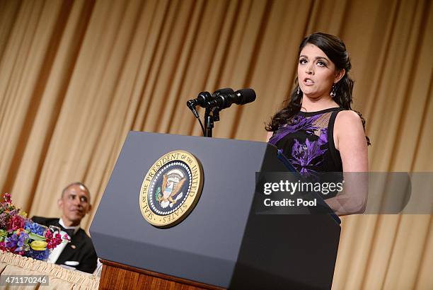 President Barack Obama listens as comedienne Cecily Strong of the Saturday Night Live show speaks at the annual White House Correspondent's...