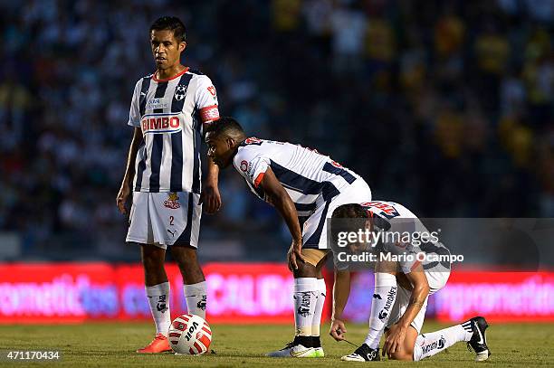 Severo Meza, Dorlan Pabon and Neri Cardozo of Monterrey prepare for a free kick during a match between Monterrey and Morelia as part of 15th round of...
