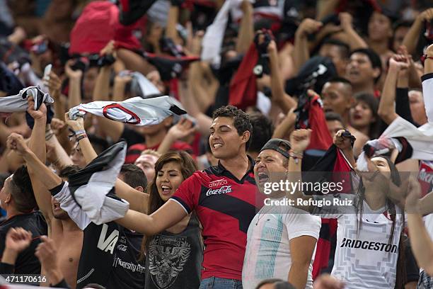 Fans of Atlas celebrate a goal during a match between Atlas and Leon as part of 15th round of Clausura 2015 Liga MX at Jalisco Stadium on April 25,...