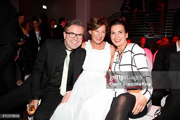 Reinhard Maetzler, Eva Lutz and Astrid Rudolph attend the Fashion Charity Event 2015 in favor of the 'RTL - Wir helfen Kindern' foundation at...