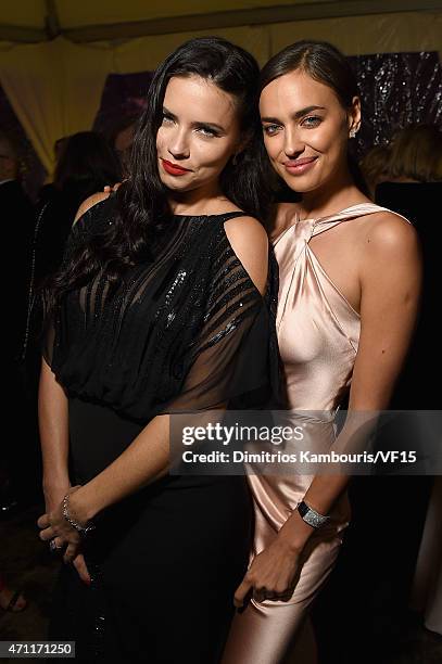 Models Adriana Lima and Irina Shayk attend the Bloomberg & Vanity Fair cocktail reception following the 2015 WHCA Dinner at the residence of the...