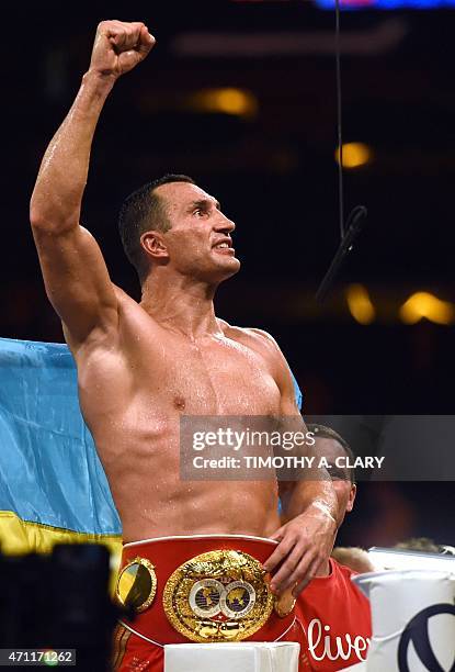 Wladimir Klitschko of the Ukraine celebrates his win over Bryant Jennings of the US after their World Heavyweight Championship boxing bout at Madison...