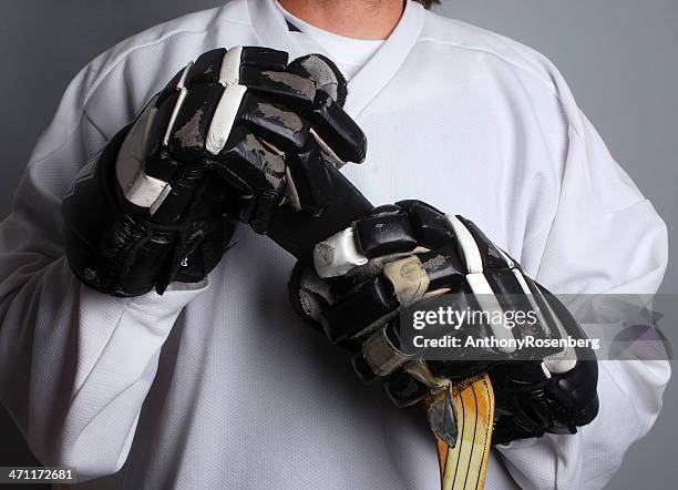 hockey player ready for the game - hockey stick stock pictures, royalty-free photos & images