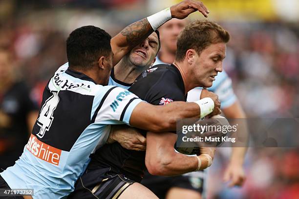 Matt Moylan of the Panthers is tackled just before the line during the round eight NRL match between the Penrith Panthers and the Cronulla Sharks at...