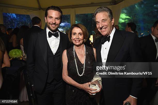 Actor Bradley Cooper, Nancy Pelosi, and Paul Pelosi attend the Bloomberg & Vanity Fair cocktail reception following the 2015 WHCA Dinner at the...