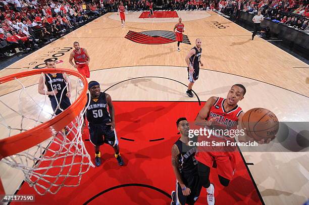 McCollum of the Portland Trail Blazers goes to the basket against the Memphis Grizzlies in Game Three of the Western Conference Quarterfinals during...