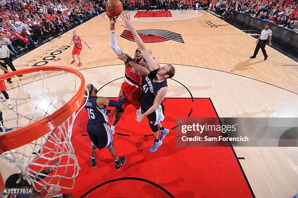 LaMarcus Aldridge of the Portland Trail Blazers shoots against Kosta Koufos of the Memphis Grizzlies in Game Three of the Western Conference...