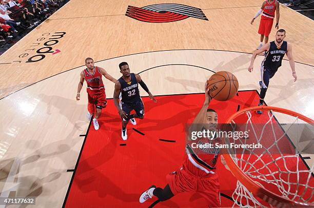 McCollum of the Portland Trail Blazers goes to the basket against the Memphis Grizzlies in Game Three of the Western Conference Quarterfinals during...