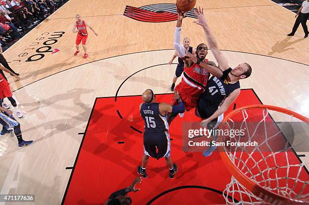 LaMarcus Aldridge of the Portland Trail Blazers goes to the basket against Kosta Koufos of the Memphis Grizzlies in Game Three of the Western...