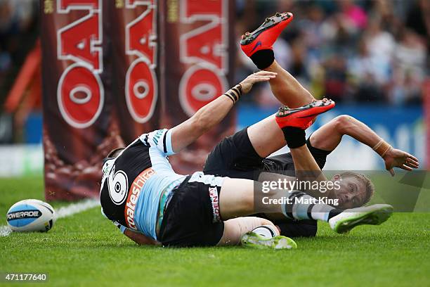 Matt Moylan of the Panthers beats Jack Bird of the Sharks to score a try during the round eight NRL match between the Penrith Panthers and the...