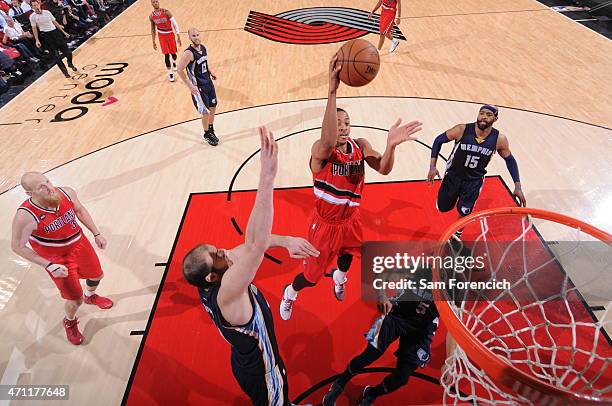McCollum of the Portland Trail Blazers goes to the basket against the Memphis Grizzlies in Game Three of the Western Conference Quarterfinals during...