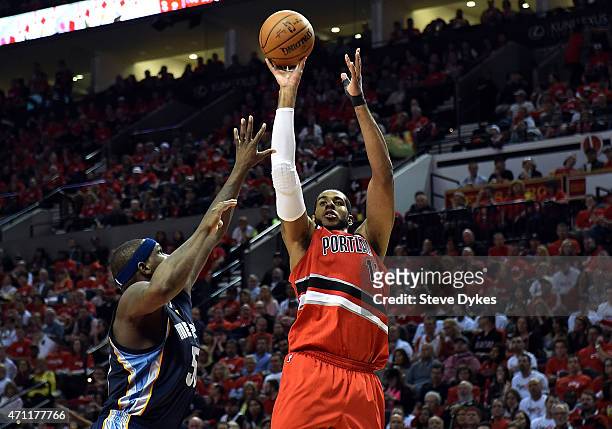 LaMarcus Aldridge of the Portland Trail Blazers shoots the ball on Zach Randolph of the Memphis Grizzlies during the fourth quarter in Game Three of...