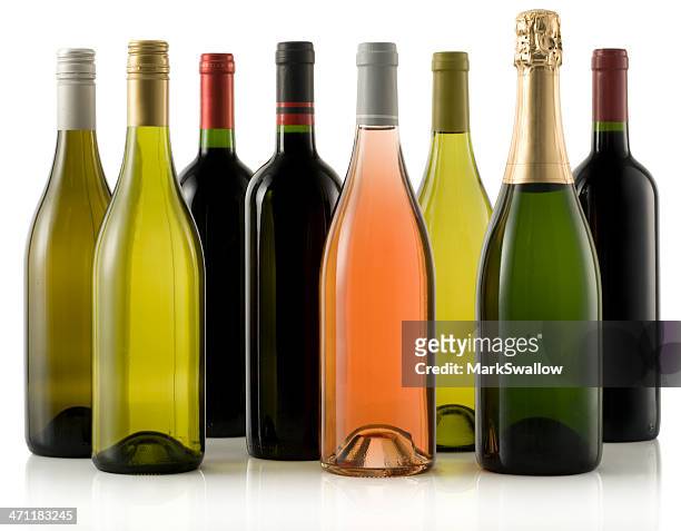 multiple wine and champagne bottles - wijnfles stockfoto's en -beelden