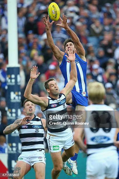 Jarrad Waite of the Kangaroos marks over the top of Jared Rivers of the Cats during the round four AFL match between the Geelong Cats and the North...