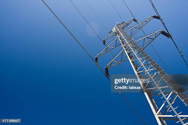 a group view of an electric tower - power cable bildbanksfoton och bilder