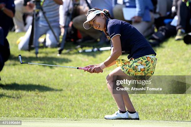 Hikari Fujita of Japan celebrates her winning putt during the third round of Fujisankei Ladies Classic at the Kawana Hotel Golf Course Fuji Course on...