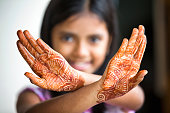 Little Girl displaying henna tattoo also called Mehendi