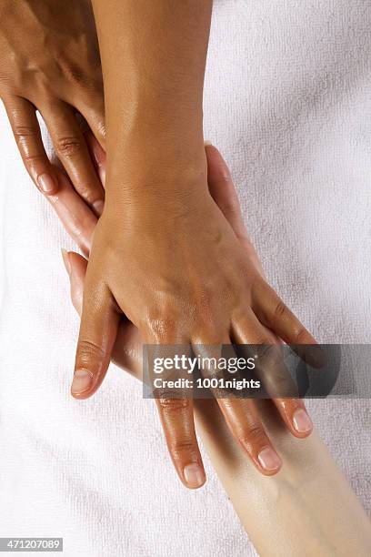 hand massage - hand massage stock pictures, royalty-free photos & images