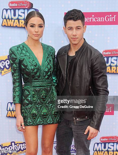 Singer Nick Jonas and Olivia Culpo arrive at the 2015 Radio Disney Music Awards at Nokia Theatre L.A. Live on April 25, 2015 in Los Angeles,...