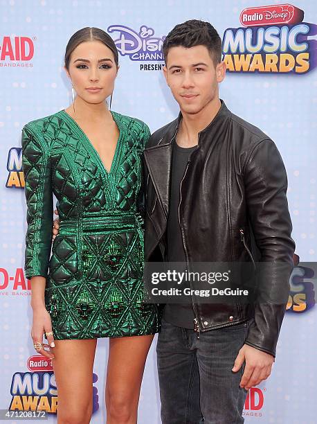 Singer Nick Jonas and Olivia Culpo arrive at the 2015 Radio Disney Music Awards at Nokia Theatre L.A. Live on April 25, 2015 in Los Angeles,...