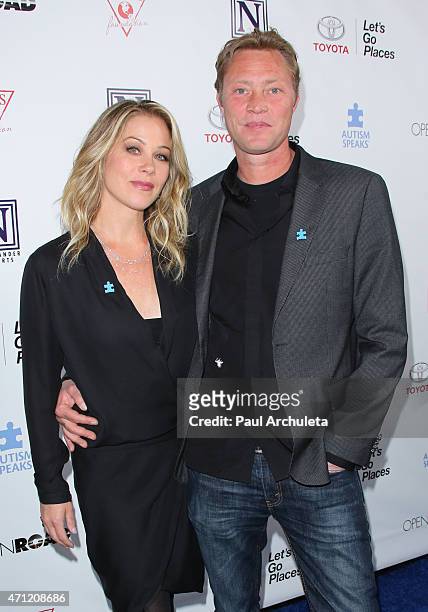 Actress Christina Applegate and her Husband Musician Martyn Lenoble attend the 3rd annual "Light Up The Blues" concert to benefit "Autism Speaks" at...