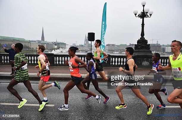 Winner of the ladies race Meseret Hailu of Ethiopia leads second placed Sylvia Kibet of Kenya and third placed Beata Naigambo of Namibia during the...