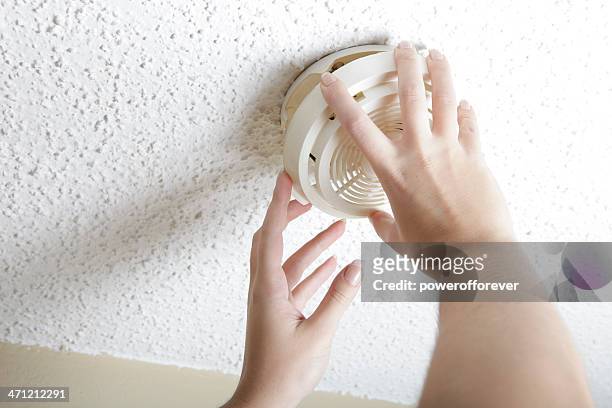 smoke detector - homme fier stock pictures, royalty-free photos & images