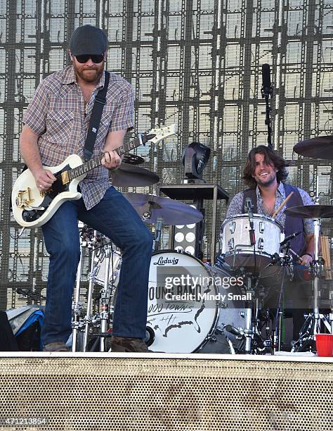 Lead guitarist, James Young and drummer, Chris Thompson of the Eli Young Band perform during Stagecoach California's Country Music Festival, day 2 at...