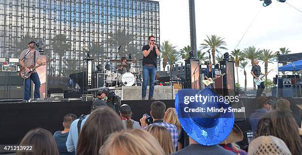 Lead guitarist James Young, drummer Chris Thompson, lead vocalist Mike Eli and bass guitar player Jon Jones of the Eli Young Band perform during...