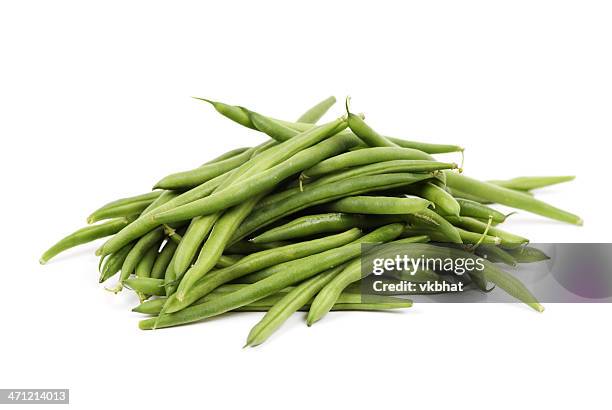 pile of fresh green beans over a white background - green bean 個照片及圖片檔