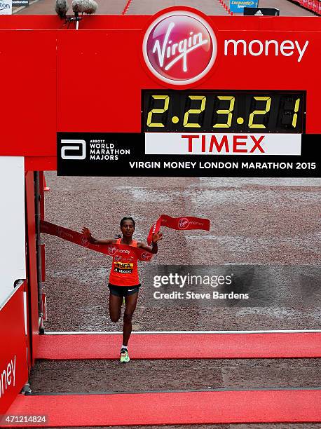 Tigist Tufa of Ethiopia crosses the finish line to win the Women's race during the Virgin Money London Marathon on April 26, 2015 in London, England.