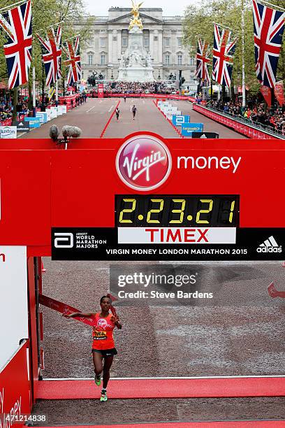 Tigist Tufa of Ethiopia crosses the finish line to win the Women's race during the Virgin Money London Marathon on April 26, 2015 in London, England.