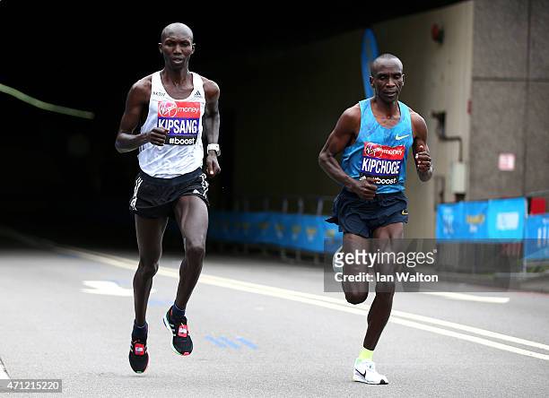 Wilson Kipsang of Kenya and Eliud Kipchoge of Kenya compete during the Virgin Money London Marathon on April 26, 2015 in London, England.