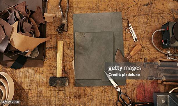 tools of the leather craft trade - craft table stock pictures, royalty-free photos & images