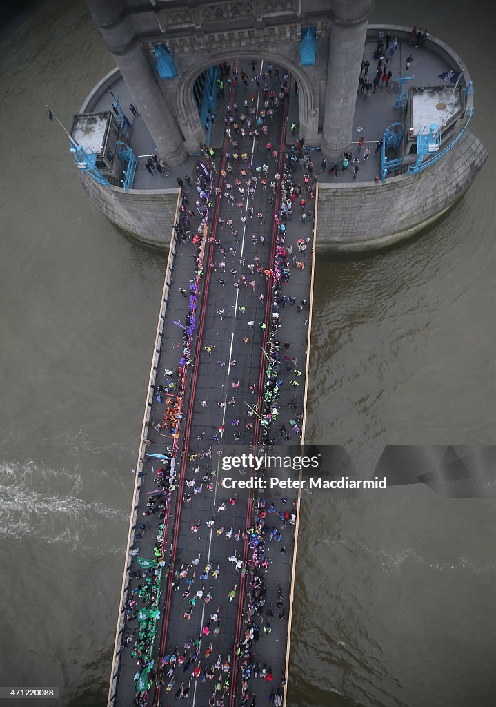 London Marathon Runners Cross Tower Bridge