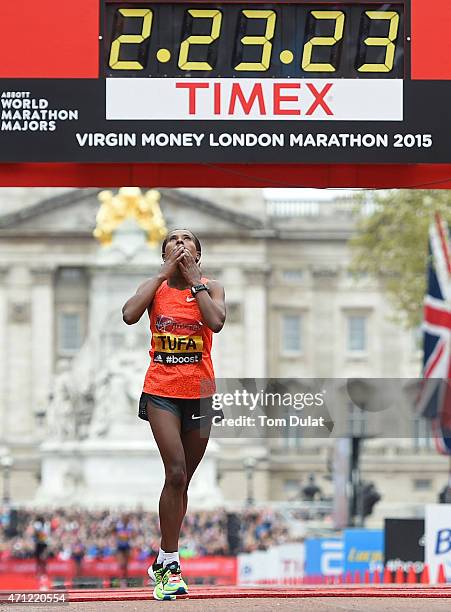 Tigist Tufa of Ethiopia celebrates after winning Women's race during the Virgin Money London Marathon on April 26, 2015 in London, England.