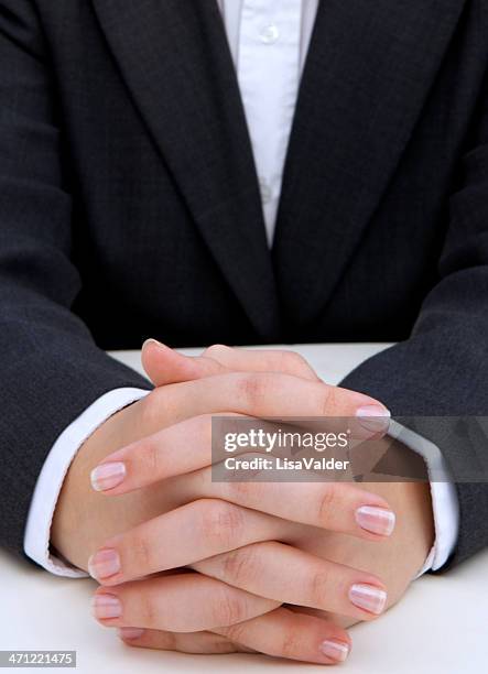 hands folded - funeral director stock pictures, royalty-free photos & images