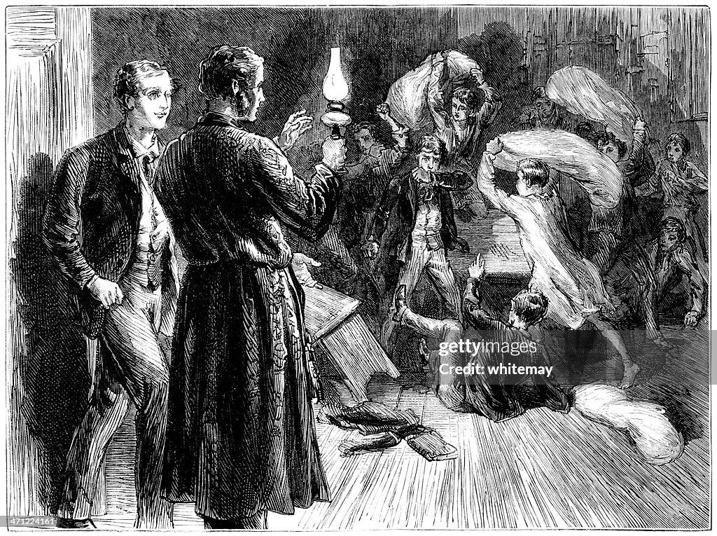 Victorian schoolboys having a pillow-fight in their school dormitory