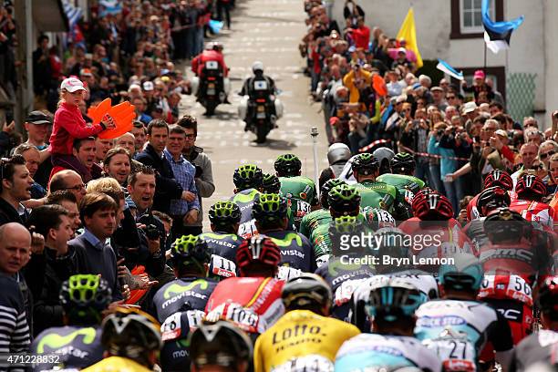 The Peloton climb through the town of Houffalize during the 101st Liege-Bastogne-Liege cycle road race on April 26, 2015 in Liege, Belgium.