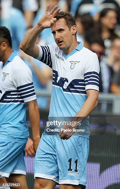 Miroslav Klose of SS Lazio celebrates after scoring the opening goal during the Serie A match between SS Lazio and AC Chievo Verona at Stadio...