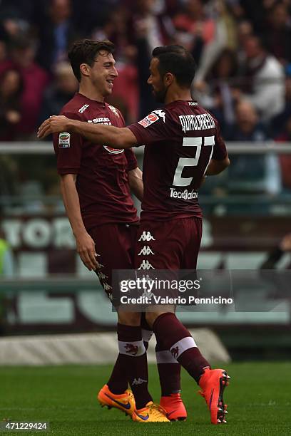 Matteo Darmian of Torino FC celebrates his goal with team mate Fabio Quagliarella during the Serie A match between Torino FC and Juventus FC at...