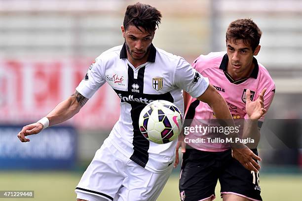 Pedro Mendes of Parma is challenged bu Ivaylo Chochev during the Serie A match between Parma FC and US Citta di Palermo at Stadio Ennio Tardini on...