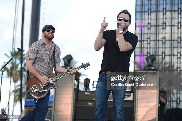 Guitarist James Young and singer Mike Eli of the Eli Young Band performs onstage during day 2 of the Stagecoach Music Festival at The Empire Polo...
