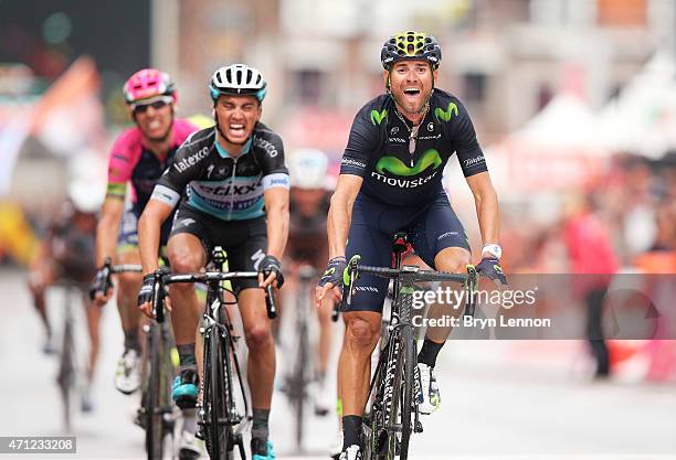 Alejandro Valverde of Spain and Movistar Team celebrates his victory as he crosses the finish line ahead of Julian Alaphilippe of France and Etixx -...