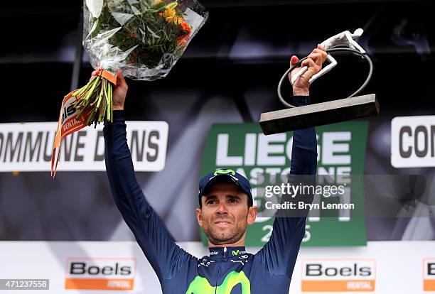 Alejandro Valverde of Spain and Movistar Team celebrates with the trophy following his victory during the 101st Liege-Bastogne-Liege cycle road race...