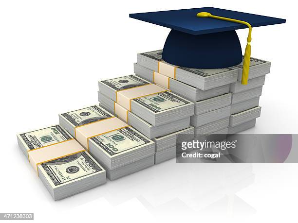 cap on the stack of dollars - education funding stock pictures, royalty-free photos & images