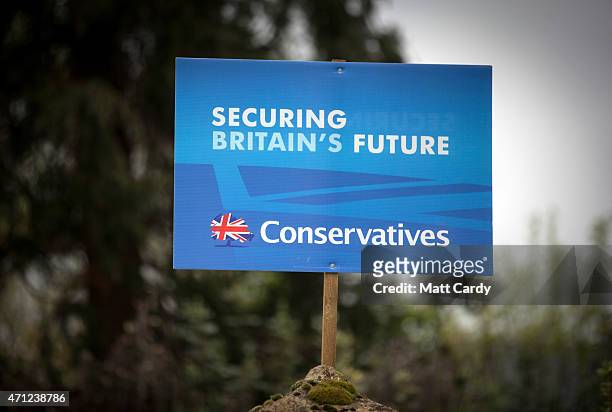 Conservative poster is displayed outside a house in the village of Norton Sub Hamdon in the Yeovil constituency on April 26, 2015 in Somerset,...