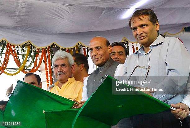 Home Minister Rajnath Singh, Railway Minister Suresh Prabhu and his deputy Manoj Sinha flagging off air-conditioned double Decker Bi-weekly superfast...
