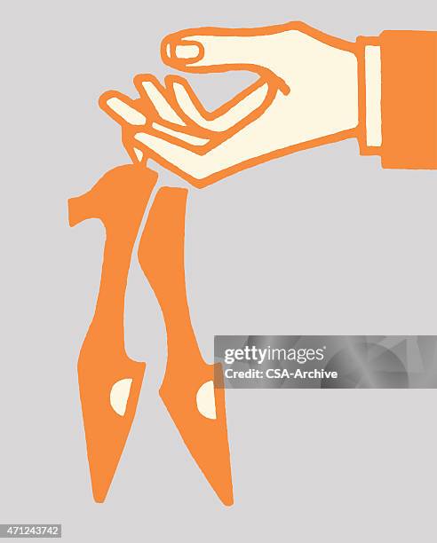 mann hand holding paar schuhe für frauen - felsmalerei stock-grafiken, -clipart, -cartoons und -symbole